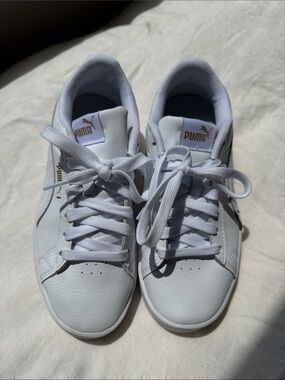 Puma White Sneakers with Metallic Gold Logo